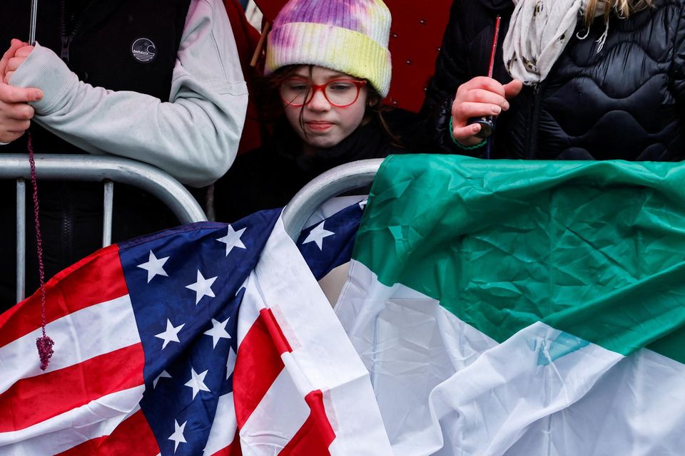 A child looks on as U.S. President Joe Biden visits Dundalk, Ireland, April 12, 2023. REUTERS/Clodagh Kilcoyne