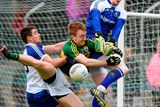 thumbnail: Kerry's Thomas Hickey gets caught between Monaghan's Drew Wylie, left, and goalkeeper Rory Beggan during their Allianz NFL, Division 1 clash
