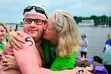 thumbnail: 19 June 2023; Team Ireland's Eoin O'Connell, a member of D6 Special Olympics Club, from Dundrum, Dublin, with his mother Marie after the Open Water Swim 1,500m on day three of the World Special Olympic Games 2023 at the Grünau regatta course in Berlin, Germany. Photo by Ray McManus/Sportsfile