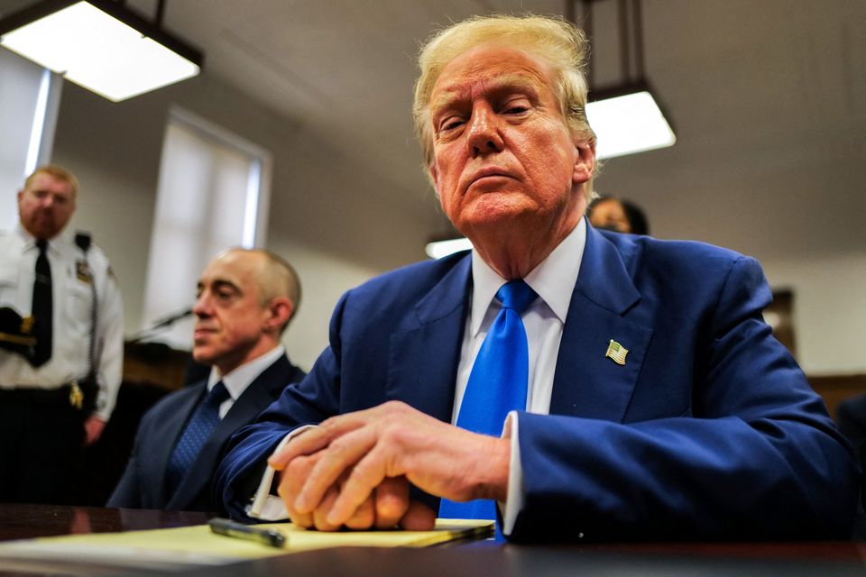 Former US president Donald Trump attends his trial for allegedly covering up hush-money payments linked to extramarital affairs at Manhattan Criminal Court yesterday. Photo: Reuters