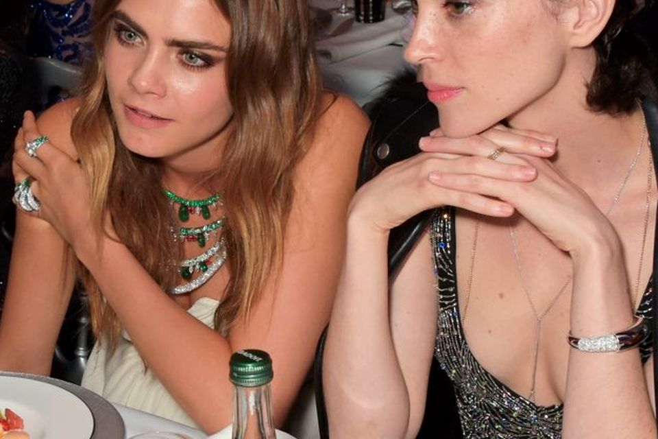 Cara Delevingne (L) and St. Vincent attend the de Grisogono 'Divine In Cannes' party at Hotel du Cap-Eden-Roc on May 19, 2015 in Cap d'Antibes, France.  (Photo by David M. Benett/Getty Images)