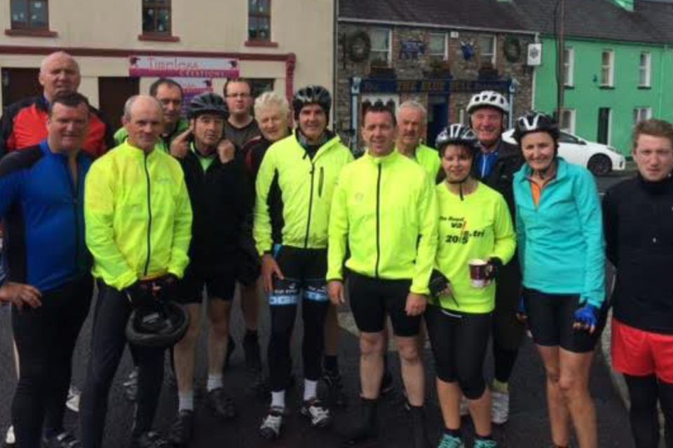 Valentia Ring of Kerry cyclists in Sneem with some Iveragh friends. Front:(from left) Con O'Shea, Pat O'Connor, Liam Lynch, Brendie Murphy, Junior Murphy, John Shanahan, Martina Reardon, Phil O'Dowd and Cian McCrohan. Back: Pa O'Connell, Eoin O'Connor, Brendan O'Connor