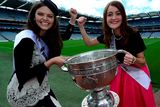 thumbnail: Dublin Rose Aisling Finnegan and Kerry Rose Julett Culloty do battle over the Sam Maguire cup during a visit to Croke Park. Photo: Domnick Walsh
