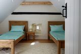 thumbnail: One of the bedrooms.