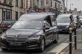 thumbnail: The hearses carrying the bodies of the Bowden family en route to Donegal on Monday. Photo: Joe Boland.