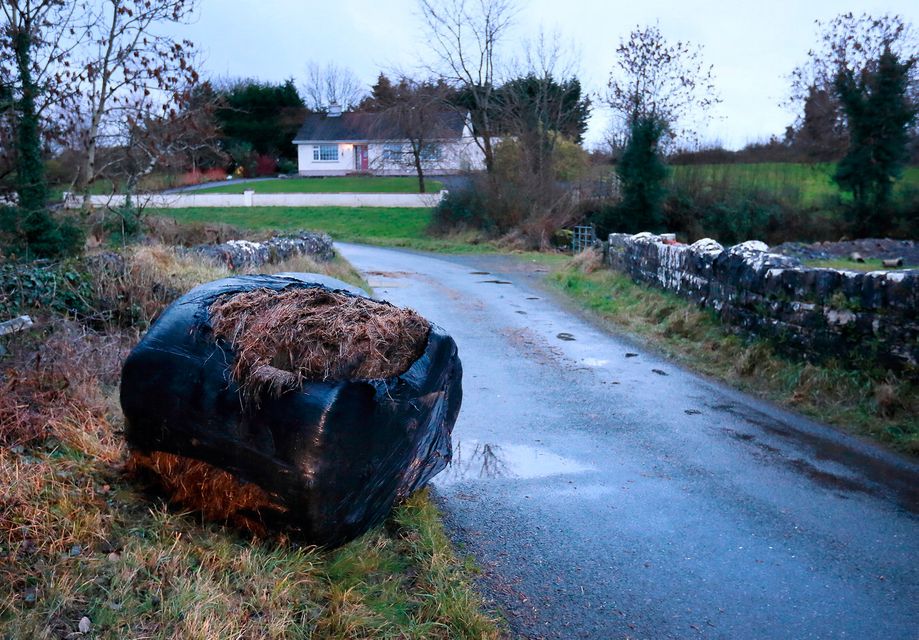 One of the bales of hay which was used to block a bridge on the night of the attack on eight security men at the property.