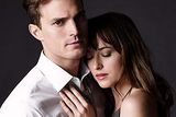 thumbnail: Jamie Dornan as Christian Grey with Dakota Johnson in ‘Fifty Shades of Grey’