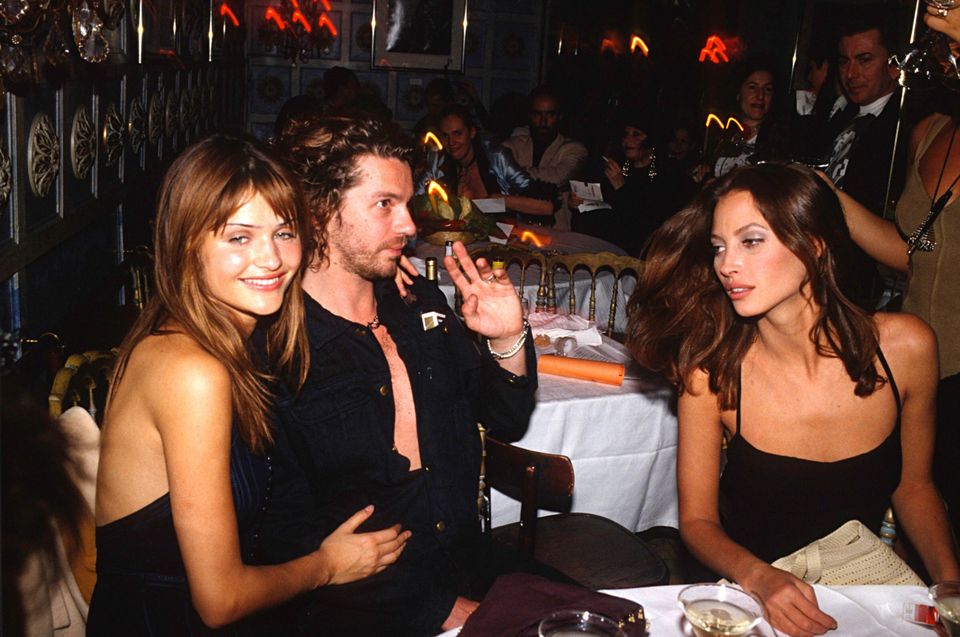 Helena Christensen dated the late INXS frontman Michael
Hutchence for five years, before he left her for Paula Yates - with Hutchence and Christy Turlington at a fashion-week party in the 1990s in Paris