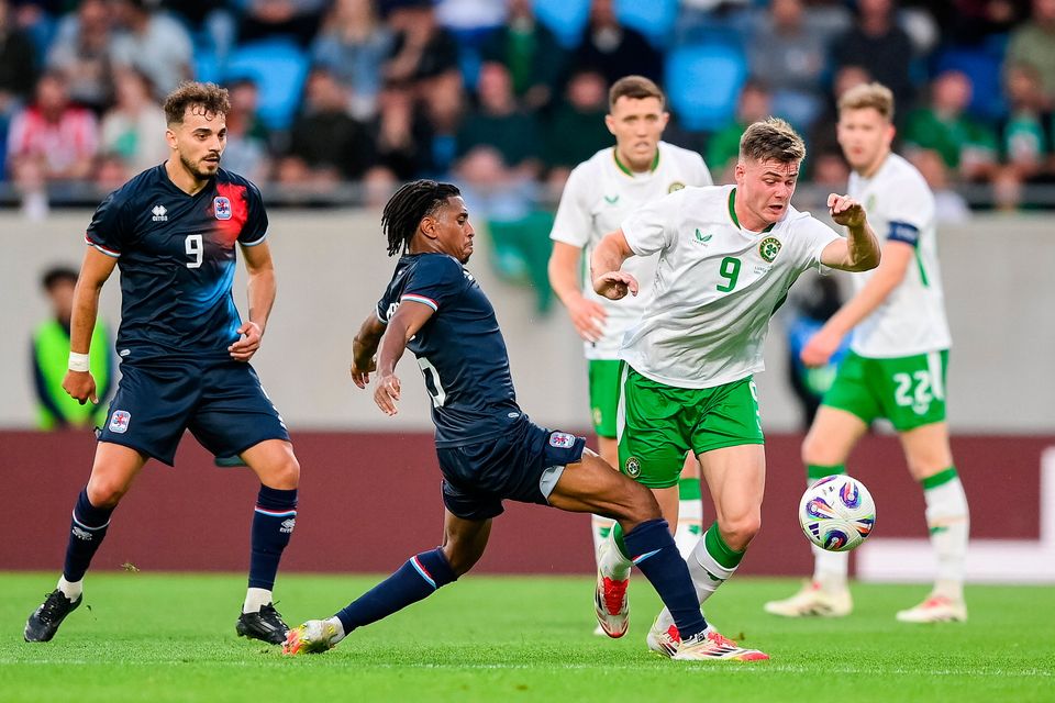 Ireland’s Evan Ferguson is tackled by Luxembourg’s Leandro Barreiro during the friendly at Stade de Luxembourg. Photo: Stephen McCarthy/Sportsfile
