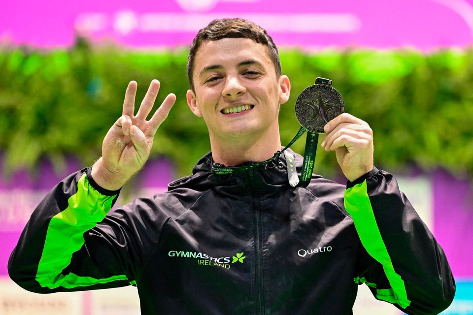 Ireland's Rhys McClenaghan celebrates with his gold medal after winning the Men's Senior Pommel Horse final on day three of the 2024 Men's Artistic Gymnastics European Championships in Rimini, Italy. Photo: Filippo Tomasi/Sportsfile