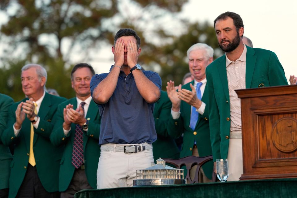 Rory McIlroy wipes his eyes before wearing the green jacket at the Masters golf tournament. Photo: AP