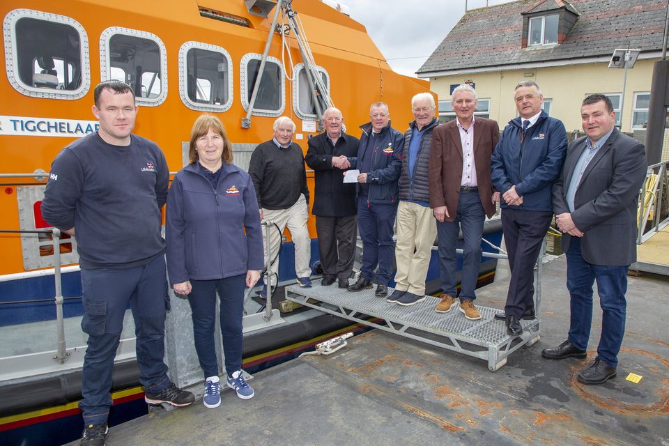 Billy Roberts, Richie Hall, Tom Craine and Hugh O'Keeffe from Arklow Credit Union present a donation to John Bermingham of the Arklow RNLI, along with James Russell, Majella Myler, Jimmy Russell and Councillor Tommy Annesley. Photo: Michael Kelly