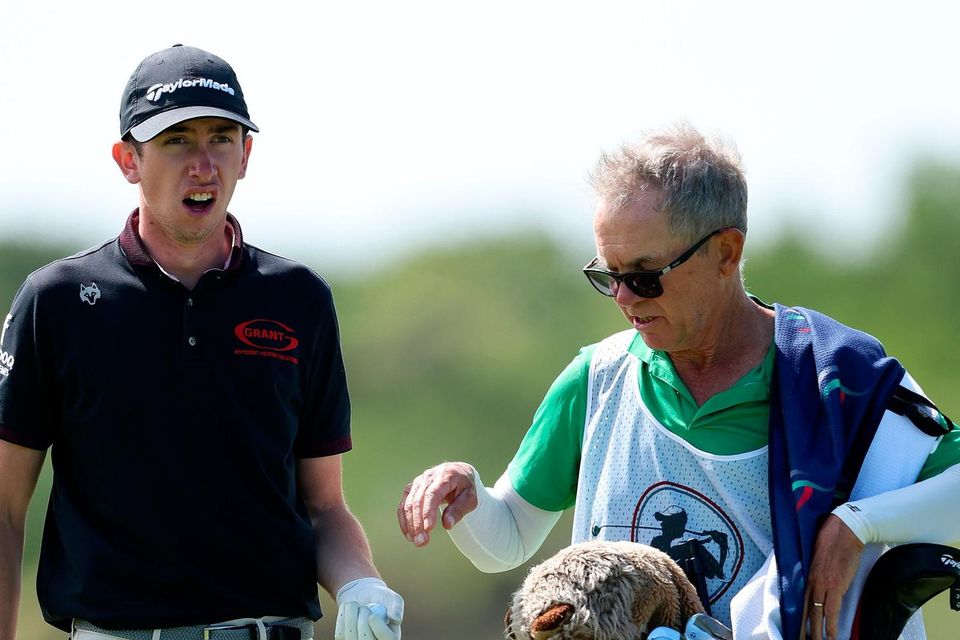 Tom McKibbin and his caddie David McNeilly on the ninth hole during the final round of the SDC Championship 2023 at St. Francis Links in South Africa. Photo: Warren Little/Getty Images