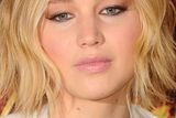 thumbnail: Jennifer Lawrence attends the photocall for "The Hunger Games: Mockingjay Part 1" at Corinthia Hotel London