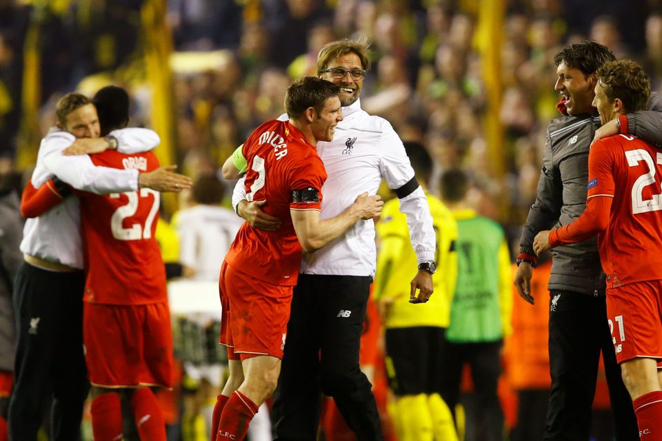 Milner and Klopp (centre) Photo: Reuters