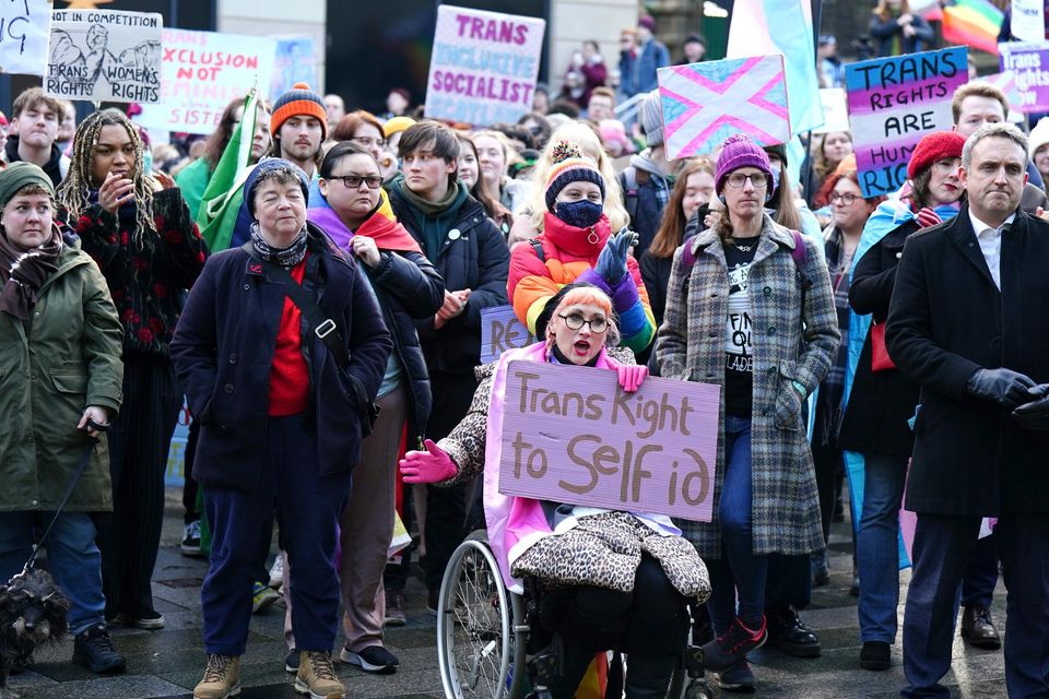 People take part in a demonstration for trans rights in the UK.