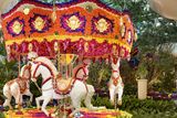 thumbnail: The carousel, made with real flowers, in the lobby of Boston's Encore Harbor Hotel