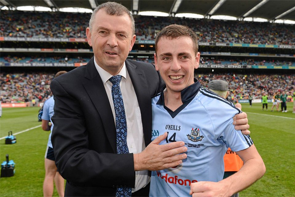 Dublin chief executive John Costello with his son Cormac following Dublin's victory over Meath in this year's All-Ireland MFC final
