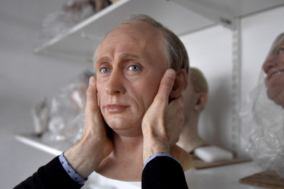 Head of state: A staff member of the Grévin museum in Paris dismantles and stores a wax statue of Putin as a reaction to Russia’s invasion of Ukraine.Photo by Julien De Rosa/Getty