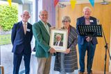 thumbnail: It was a poignant night too for the Ard Chúram as they remembered their cherished former director Brendan O’Sullivan. Former Chairperson Tom Pierse presented Brendan’s wife Del with a special portrait of her late husband; with secretary Mike Moriarty pictured, left, and Ard Chúram chairperson Finbarr Mawe on right. Photos by John Kelliher