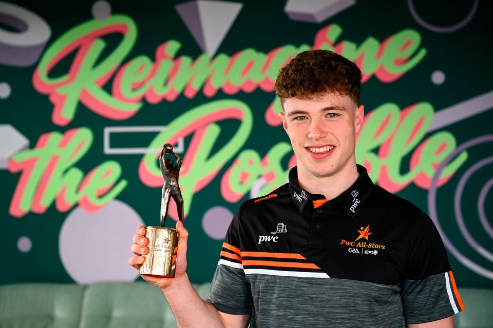  PwC GAA/GPA Player of the Month for March in football, Eoin McEvoy of Derry, with his award at PwC offices in Dublin today. Photo by Ramsey Cardy/Sportsfile