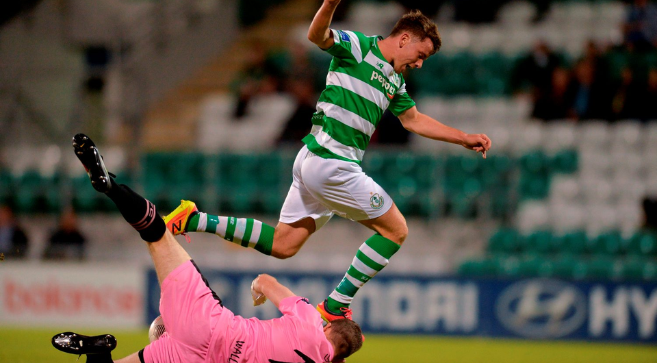 Dean Clarke of Shamrock Rovers in action against Graham Doyle of Wexford Youths. Photo: Eóin Noonan/Sportsfile