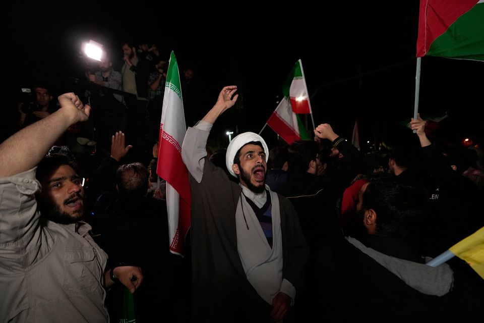 Iranian demonstrators chant slogans during an anti-Israeli gathering in front of the British embassy in Tehran. Photo: AP