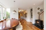 thumbnail: The dining area which leads into the kitchen