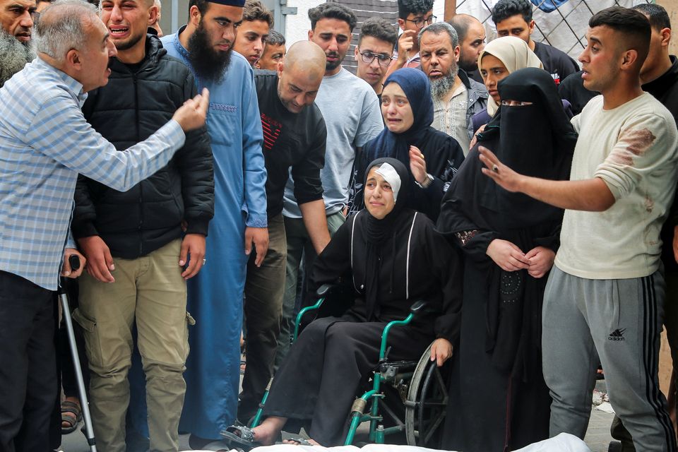 Mourners react during the funeral of Palestinians killed in Israeli strikes, amid the ongoing conflict between Israel and the Palestinian Islamist group Hamas, in Rafah, in the southern Gaza Strip, April 29, 2024. Reuters/Hatem Khaled