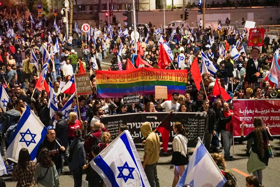 Protesters attend a demonstration against Israeli Prime Minister Benjamin Netanyahu and his nationalist coalition government's plan for judicial overhaul, in Tel Aviv, Israel. Photo: Reuters/Itai Ron
