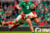 thumbnail: Ireland’s Simon Zebo is tackled by Taulupe Faletau during their draw. Picture credit: Stephen McCarthy / Sportsfile