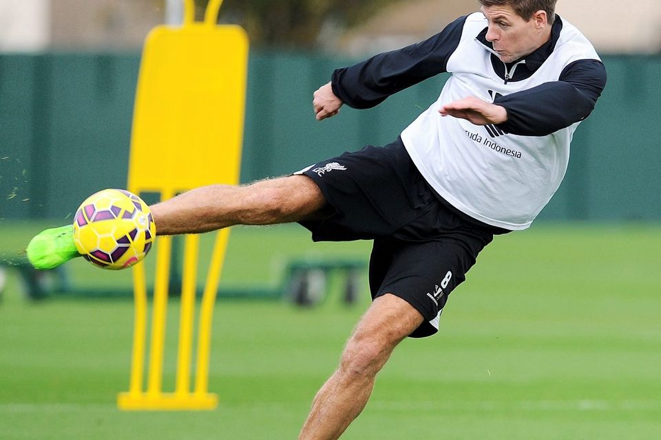 Steven Gerrard in action during a training session in Melwood yesterday. John Powell/Liverpool FC via Getty Images