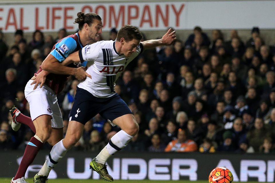 Jan Vertonghen, right, is expecting a battle with West Ham's Andy Carroll, left, on Saturday