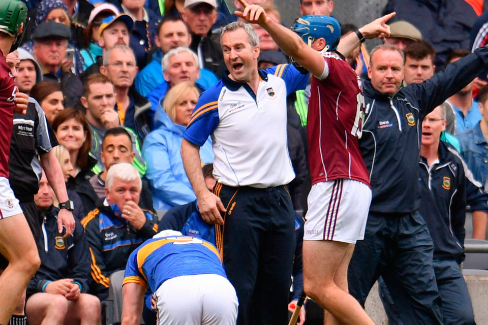 Tipperary manager Michael Ryan and several Galway players debate a lineball during yesterday’s All-Ireland SHC semi-final at Croke Park. Photo: Sportsfile