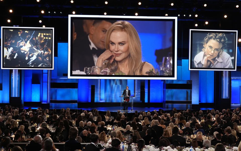 Kidman is seen on a video monitor as her husband addresses the ceremony (Chris Pizzello/AP)