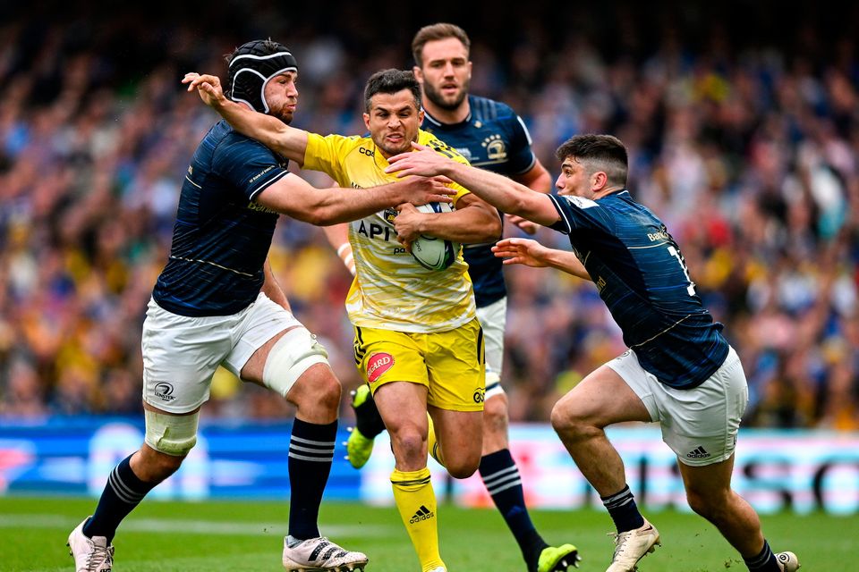 Brice Dulin of La Rochelle is tackled by Caelan Doris, left, and Jimmy O'Brien of Leinster during the Champions Cup final at Aviva Stadium in Dublin. Photo by Brendan Moran/Sportsfile