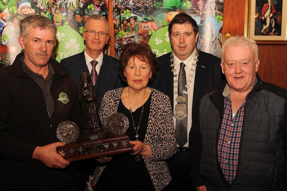 Anne O'Keeffe presents the Sean O'Keeffe Memorial Perpetual award for Best Overall Entry to John Courtney and Ger Healy, Killarney Vallery Classic & Vintage Club. Also included are PJ McGee, Daly's SuperValu, sponsor, and Cllr Niall Kelleher, Mayor of Killarney, at the St. Patrick's Festival Killarney parade prizegiving function in The International Hotel on Tuesday night. Picture: Eamonn Keogh