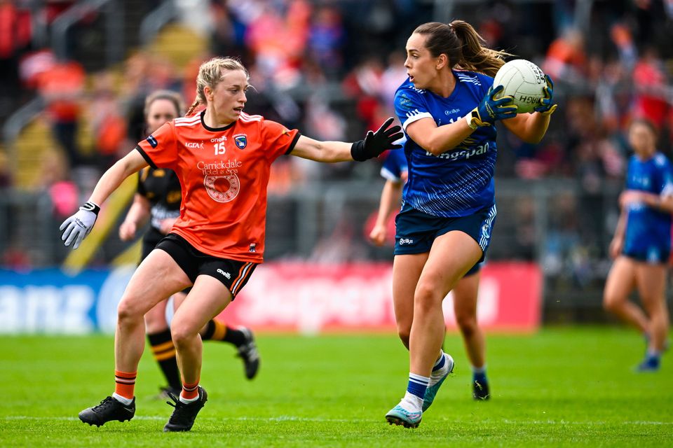 Aishling Sheridan of Cavan in action against Aoife McCoy of Armagh. Photo by Ramsey Cardy/Sportsfile