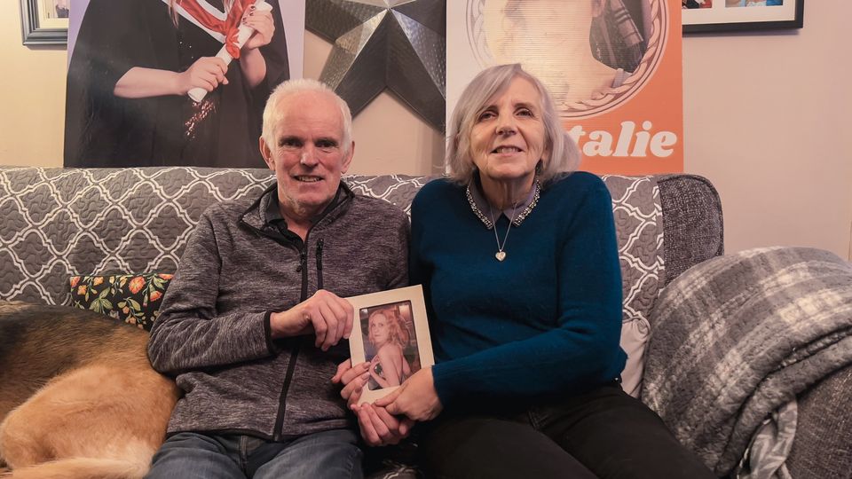 Noel and Bernie McNally at home holding a picture of daughter Natalie McNally. Picture: Kevin Scott
