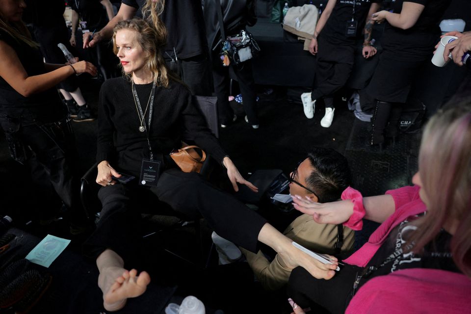 Model Eva Herzigova is prepared backstage ahead of the 2024 Victoria's Secret Fashion Show in New York City, U.S., October 15, 2024. REUTERS/Andrew Kelly