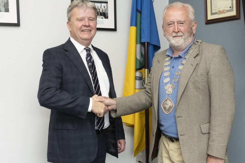 Cllr Edward Timmins handing over the Chain of Office to the new Cathaoirleach Cllr Patsy Glennon at the Baltinglass Municipal District Office.  Photo: Barry Hamilton
