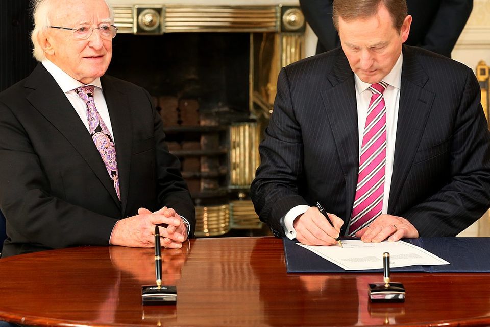 President Michael D. Higgins and Taoiseach Enda Kenny at the Aras An Uachtarain where the Dail was dissolved. Photo: Steve Humphreys