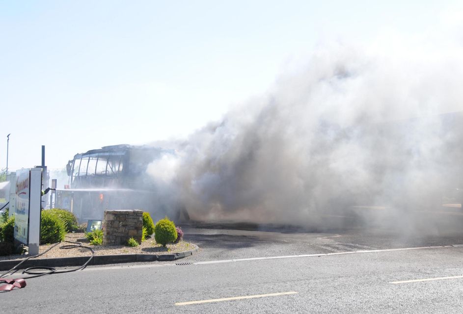 Bus on fire outside of Supermac's near  Westport. Photo: Frank Dolan.