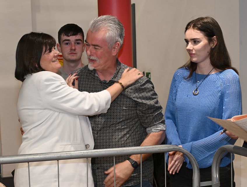 A delighted Michelle Hall is congratulated by her husband Joe and children Robyn and Liam at the count in County Hall. Photo: Ken Finegan/Newspics Photography