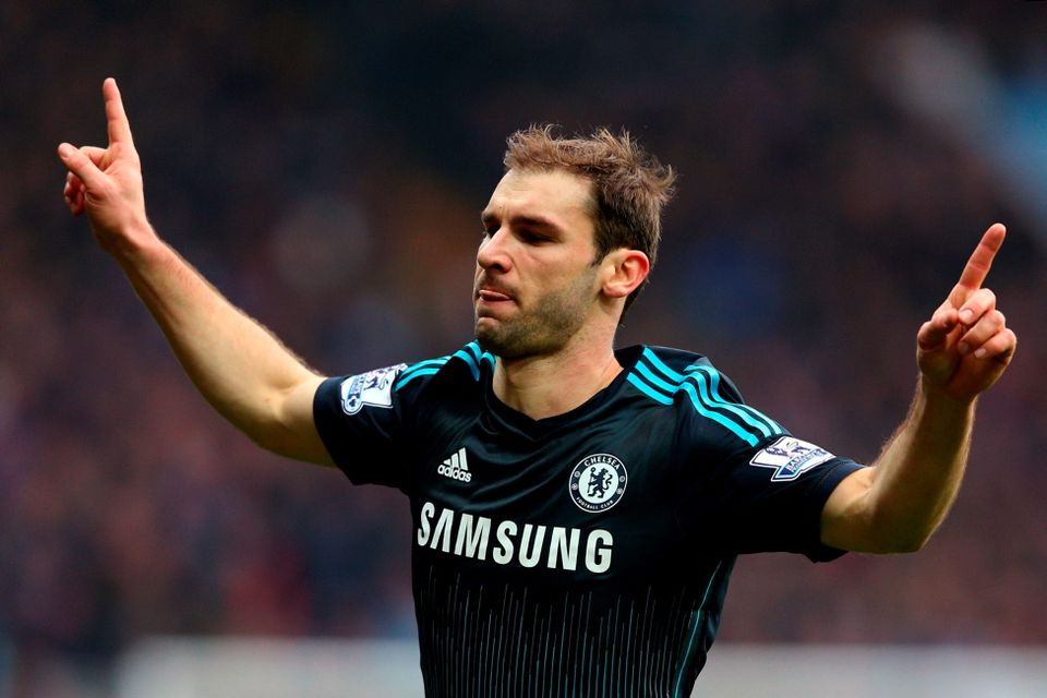 Branislav Ivanovic of Chelsea celebrates after scoring his team's second goal during the Barclays Premier League match between Aston Villa and Chelsea at Villa Park on February 7, 2015 in Birmingham
