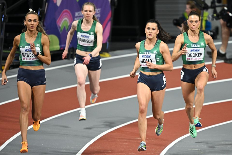 Ireland's Sharlene Mawdsley, Roisin Harrison, Phil Healy and Sophie Becker make their way to the start of the Women's 4 x 400m Relay final at the World Indoor Athletics Championships in Glasgow last month.