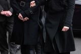 thumbnail: Gillian Quinn and her daughter Aisling arrive at St Marys Church, Killenaule, Co. Tipperary for the funeral of Billy Quinn