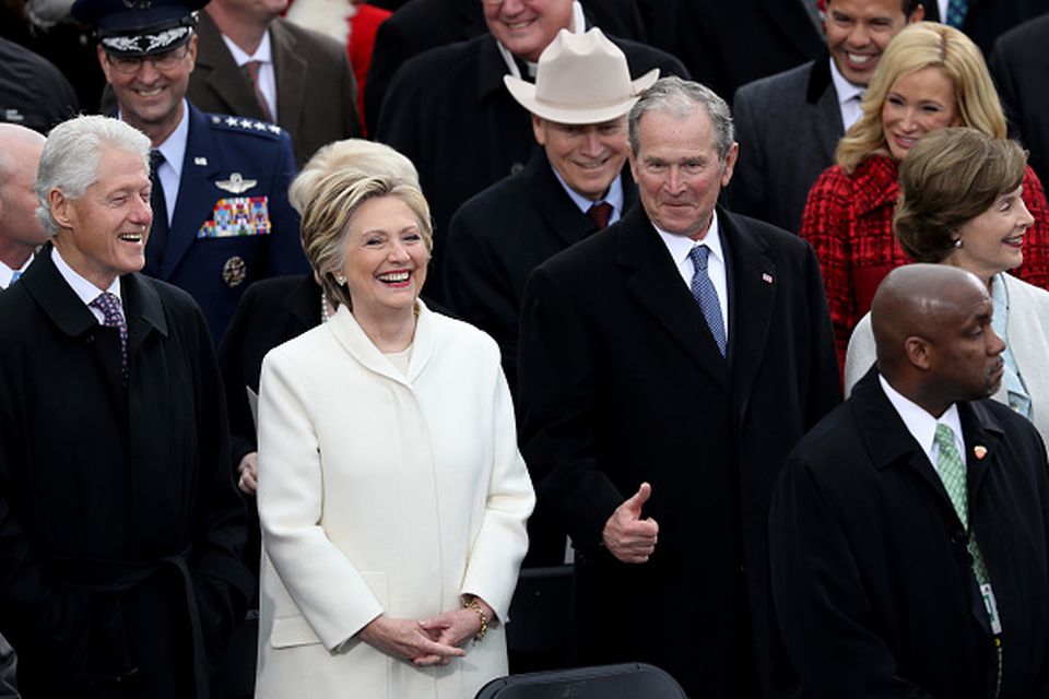 Former President Bill Clinton (L), former Democratic presidential nominee Hillary Clinton and former President George W. Bush stand  on the West Front of the U.S. Capitol on January 20, 2017 in Washington, DC. In today's inauguration ceremony Donald J. Trump becomes the 45th president of the United States.  (Photo by Joe Raedle/Getty Images)