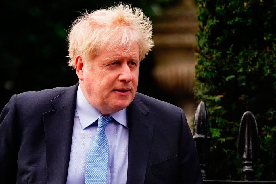 Boris Johnson leaving his home in London ahead of giving evidence on Wednesday. Photo: Victoria Jones/PA Wire