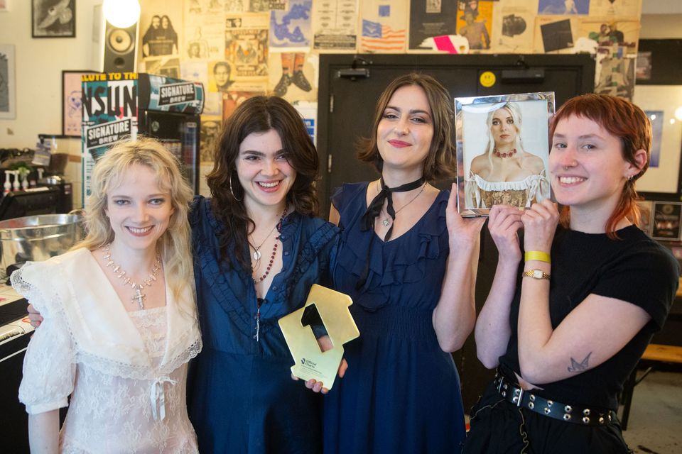 The Last Dinner Party with their Official Number 1 award (Official Charts Company/PA)